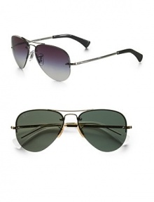 The high-flying classic, now in a rimless metal style with double-bridge detail. Available in silver frames with grey gradient lenses or arista frames with green lenses. UV400 lenses Made in Italy The high-flying classic, now in a rimless metal style with double-bridge detail. Available in silver frames with grey gradient lenses or arista frames with green lenses. UV400 lenses Made in Italy