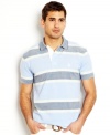 Clean up your casual look with this oxford stripe polo shirt from Nautica.