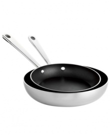 Making a brilliant breakfast is easy with this tri-ply duo of French skillets. Raised sides keep splatter and mess to a minimum while you flip and turn spinach & feta omelets, stuffed French toast and other savory morning treats. A bonded stainless steel construction features a pure aluminum core and three layers of Eterna® nonstick coating for unbeatable heating and effortless release. Lifetime limited warranty. Making a brilliant breakfast is easy with this tri-ply duo of French skillets. Raised sides keep splatter and mess to a minimum while you flip and turn spinach & feta omelets, stuffed French toast and other savory morning treats. A bonded stainless steel construction features a pure aluminum core and three layers of Eterna® nonstick coating for unbeatable heating and effortless release. Lifetime limited warranty.