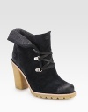 Fully lined in warm fleece, this elevated ankle boot is crafted with subtly distressed suede for a worn-in look. Rubber heel, 4 (100mm)Rubber platform, ½ (15mm)Compares to a 3½ heel (90mm)Suede upperFleece liningRubber trek solePadded insoleImported