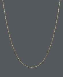 Spherical and cylindrical beads link together to form this more modern dot-dash style chain. Necklace crafted of 14k gold. Approximate length: 18 inches.