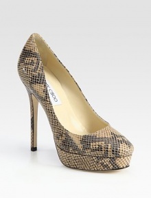 Textured leather in a primal print, finished with a covered platform and skinny heel. Self-covered heel, 5 (125mm)Covered platform, 1 (25mm)Compares to a 4 heel (100mm)Snake-embossed leather upperLeather liningBuffed leather solePadded insoleMade in ItalyOUR FIT MODEL RECOMMENDS ordering true whole size; ½ sizes should order the next whole size up. 