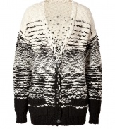 Perfect for wearing with edgy leather leggings, Iros chunky knit cardigan is a contemporary cozy choice, guaranteed to keep your cool weather look chic - V-neckline, long sleeves, ribbed trim, front patch pockets - Easy straight silhouette - Wear with button-downs, form-fitting trousers and chunky ankle boots