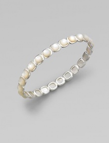 From the Scultura Collection. Squared, silver-framed cushions of creamy mother-of-pearl line up to form a charming bangle with a rich luster.Mother-of-pearlSterling silverDiameter, about 2½Imported From the Scultura Collection. Squared, silver-framed cushions of creamy mother-of-pearl line up to form a charming bangle with a rich luster.Mother-of-pearlSterling silverDiameter, about 2½Imported
