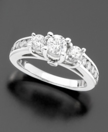 A three stone ring that gleams with elegance. This diamond ring features round- and brilliant-cut and diamonds (1-1/2 ct. t.w.) set in 14k white gold. A three stone ring that gleams with elegance. This diamond ring features round- and brilliant-cut and diamonds (1-1/2 ct. t.w.) set in 14k white gold.