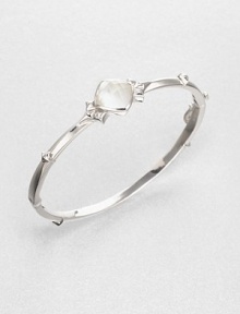 From the Superstud Collection. A graceful bangle of bright sterling silver is dotted with pointy studs and highlighted by a faceted cushion of mother-of-pearl layered with clear quartz for a luminous effect.Mother-of-pearl and clear quartzRhodium-plated sterling silverDiameter, about 2.25Box-and-tongue claspImported From the Superstud Collection. A graceful bangle of bright sterling silver is dotted with pointy studs and highlighted by a faceted cushion of mother-of-pearl layered with clear quartz for a luminous effect.Mother-of-pearl and clear quartzRhodium-plated sterling silverDiameter, about 2.25Box-and-tongue claspImported