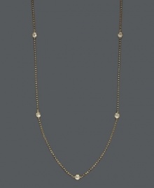 Layer yourself with inch upon inch of sparkle. Trio by Effy Collection's stunning necklace features seven stations of round cut, bezel-set diamonds (5/8 ct. t.w.) strung from a delicate, 14k gold chain. Approximate length: 24 inches. Layer yourself with inch upon inch of sparkle. Trio by Effy Collection's stunning necklace features seven stations of round cut, bezel-set diamonds (5/8 ct. t.w.) strung from a delicate, 14k gold chain. Approximate length: 24 inches.