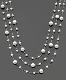 Three tiers of vivacious beauty. This necklace features cultured freshwater pearls (4-8 mm) set in sterling silver. Approximate length: 18 inches. Approximate drop: 2 inches.