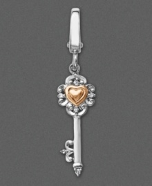 Keep the key to your heart close at hand with this Victorian-inspired sterling silver key charm featuring a 14k gold heart surrounded by shimmering diamond accents. Approximate drop: 1-1/2 inches.