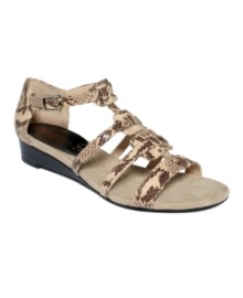 Sophisticated and chic. Ellen Tracy's Christie wedge sandals are a welcome addition to your gladiator collection. Sophisticated and chic. Ellen Tracy's Christie wedge sandals are a welcome addition to your gladiator collection.