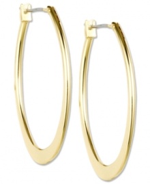 Hoops are always in style! These large, oval-shaped earrings from Anne Klein will have you looking fab in a flash. Crafted in gold tone mixed metal. Approximate diameter: 1 inch.