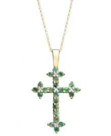 Boldly express your faith. This intricate cross pendant displays round-cut emeralds (1-1/6 ct. t.w.) and sparkling diamond accents set in 14k gold. Approximate length: 18 inches. Approximate drop: 1-1/4 inches. Boldly express your faith. This intricate cross pendant displays round-cut emeralds (1-1/6 ct. t.w.) and sparkling diamond accents set in 14k gold. Approximate length: 18 inches. Approximate drop: 1-1/4 inches.