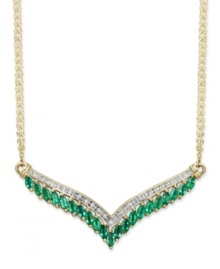 Enhance the glamour of an elegant v-neck gown. This v-shaped pendant necklace is adorned by marquise-cut emeralds (1-1/2 ct. t.w.) and a seamless row of round-cut diamonds (1/7 ct. t.w.). Crafted in 14k gold. Approximate length: 18 inches. Approximate drop length: 1 inch. Approximate drop width: 2-7/8 inches. Enhance the glamour of an elegant v-neck gown. This v-shaped pendant necklace is adorned by marquise-cut emeralds (1-1/2 ct. t.w.) and a seamless row of round-cut diamonds (1/7 ct. t.w.). Crafted in 14k gold. Approximate length: 18 inches. Approximate drop length: 1 inch. Approximate drop width: 2-7/8 inches.