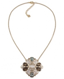 Clustered cool. Carolee's necklace, crafted from gold-tone mixed metal, stuns with a pendant bringing together glass pearls, cubic zirconias and epoxy stones to beautiful effect. Approximate length: 17 inches. Approximate drop: 2-1/4 inches.