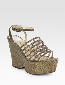 Glitter-coated metallic lurex wedge with a glitzy, cage-like upper and an adjustable ankle strap. Self-covered wedge, 4½ (115mm)Covered platform, 2 (50mm)Compares to a 2½ heel (65mm)Glitter-coated metallic lurex upperLeather and lurex liningBuffed leather solePadded insoleImported