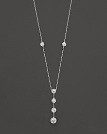 White gold bezel-set diamond necklace with four-stone drop pendant. With signature ruby accent. Designed by Roberto Coin.