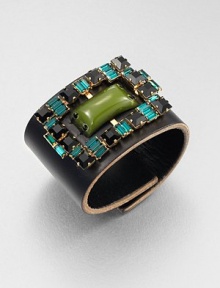 Luxurious leather accented with a glossy resin cabochon surrounded by glittering stones. LeatherResinGlassBrassLength, about 8.7Snap button closureMade in Italy and imported Luxurious leather accented with a glossy resin cabochon surrounded by glittering stones. LeatherResinGlassBrassLength, about 8.7Snap button closureMade in Italy and imported
