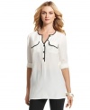 Contrasting piped trim makes this Alfani blouse stand apart--easily pairs with dark skinny jeans or a pencil skirt.