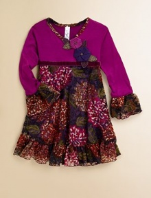 A lacy, vintage-inspired frock in a faux wrap silhouette with velvet trim and a deeply hued floral print for the budding fashionista in your life.V-neckLong bell sleevesPullover styleVelvet belted waistRuffled hemLined skirtBodice: 95% rayon/5% spandexSkirt: 95% polyester/5% spandexHand washMade in the USA of imported fabric A lacy, vintage-inspired frock in a faux wrap silhouette with velvet trim and a deeply hued floral print for the budding fashionista in your life.V-neckLong bell sleevesPullover styleVelvet belted waistRuffled hemLined skirtBodice: 95% rayon/5% spandexSkirt: 95% polyester/5% spandexHand washMade in the USA of imported fabric