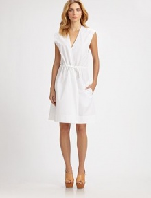 Breezy and beautiful with delicate drawstring details, rendered in crisp cotton poplin.Surplice necklineDrawstring shouldersSleevelessDrawstring waistBack pleatsAbout 22½ from natural waistCottonDry cleanImported