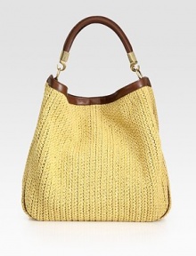 An incredibly roomy bag crafted from woven raffia and sumptuous leather trim.Top handle, 9½ dropTop snap closureOne inside zip pocketTwo inside open pocketsSuede lining14W X 14½H X 6DImported An incredibly roomy bag crafted from woven raffia and sumptuous leather trim.Top handle, 9½ dropTop snap closureOne inside zip pocketTwo inside open pocketsSuede lining14W X 14½H X 6DImported