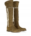 Up the style quotient of your cold weather look with these rugged-luxe shearling boots from Rossano Bisconti - Round toe, chunky sole and low block heel, supple suede, over-the-knee length with the option to fold-over, shearling lined - Style with skinny jeans, an oversized cashmere pullover, and a cape coat