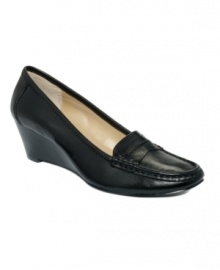 Not your average loafer, the Ettamay wedges pump up the volume and add ladylike style to this traditional staple in comfort. Not your average loafer, the Ettamay wedges pump up the volume and add ladylike style to this traditional staple in comfort.