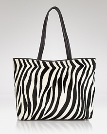 This perennially polished DKNY carryall gets wild in spot-splashed calf hair with luxe leather trim. Elegantly on-trend, let this beauty be the basis of your next fashion moment. This perennially polished DKNY carryall gets wild in spot-splashed calf hair with luxe leather trim. Elegantly on-trend, let this beauty be the basis of your next fashion moment.