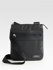 A stylish, versatile crossbody bag perfect for the man on-the-go, crafted in smooth, resilient nylon with signature logo detail.Zip closureAdjustable shoulder strapExterior, interior zip pocketsNylon10W x 11HMade in Italy A stylish, versatile crossbody bag perfect for the man on-the-go, crafted in smooth, resilient nylon with signature logo detail.Zip closureAdjustable shoulder strapExterior, interior zip pocketsNylon10W x 11HMade in Italy