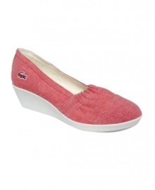 Kick back in Lacoste's easygoing sneaks. The Arlesia features a subtle wedge and cool slip-on design perfect for weekend wear. Kick back in Lacoste's easygoing sneaks. The Arlesia features a subtle wedge and cool slip-on design perfect for weekend wear.