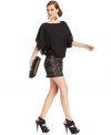 Sequins add high-shine to this MM Couture dress for a glam soiree look -- perfect for the holiday season!