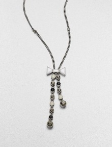 A long, graceful chain with an oxidized finish dangles a lariat of faceted stone strands, capped by a pretty bow.Glass and epoxy stonesOxidized rhodium finishLength, about 25Lobster claspImported A long, graceful chain with an oxidized finish dangles a lariat of faceted stone strands, capped by a pretty bow.Glass and epoxy stonesOxidized rhodium finishLength, about 25Lobster claspImported