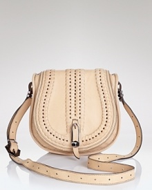 Take your accessories portfolio in a Western direction with Oryany's leather saddlebag. In a classic shape and prairie-inspired palette, this bag loves dark rinse denim and boots. Take your accessories portfolio in a Western direction with Oryany's leather saddlebag. In a classic shape and prairie-inspired palette, this bag loves dark rinse denim and boots.