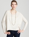 A melange of stitches adorn this lightweight Eileen Fisher boxy top, lending textural interest to an easygoing essential.