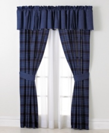 This Westerly Stripe window valance from Tommy Hilfiger features a landscape of blue stripes that perfectly coordinate with your bedding ensemble. This Westerly Stripe window valance from Tommy Hilfiger features a landscape of blue stripes that perfectly coordinate with your bedding ensemble.