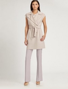 This wonderfully soft trench-inspired style features goldtone buttons and a matching sash belt.Notched lapelsCap sleevesDouble-breasted button frontSelf beltAbout 35 from shoulder to hem60% wool/30% angora/10% cashgoraDry cleanMade in ItalyModel shown is 5'11 (180cm) wearing US size 4. 