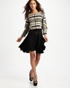 Muted stripes diverge in this cropped toppper, finished with geometric seaming.Jewel neckline Raglan sleeves Zipper front About 18¾ from shoulder to hem 84% acrylic/14% nylon/2% other fibers Dry clean Imported