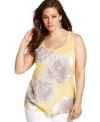 A refreshing floral-print brightens up INC's sleeveless plus size top for a season-perfect look.