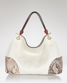 With a neutral hue to complement all of your looks and room for the daytime essentials, Furla's slouchy grain leather shoulder bag is one to covet. Carry it to elegantly nod to this season's exotic bag trend. With a neutral hue to complement all of your looks and room for the daytime essentials, Furla's slouchy grain leather shoulder bag is one to covet. Carry it to elegantly nod to this season's exotic bag trend.