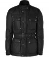 Sporty outdoor Roadmaster jacket in black waxed cotton by in-label Belstaff - Classic 50s biker jacket with flap pockets, belted waistline, hidden front zip with additional push button catch, gunmetal-toned buttons, weather proof - Classic straight fit - Team with classic knits and chic colored cords