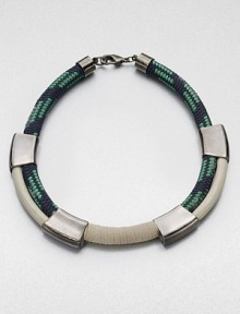A statement piece in enamel painted rope accented with shiny metal stations and soft suede. Enamel painted ropeBraided ropeGunmetal-finished metalSuedeLength, about 18Lobster clasp closureMade in USA A statement piece in enamel painted rope accented with shiny metal stations and soft suede. Enamel painted ropeBraided ropeGunmetal-finished metalSuedeLength, about 18Lobster clasp closureMade in USA