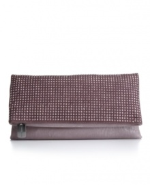 Steal the spotlight with BCBGeneration's sparkly and eye-catching Lola clutch. Steal the spotlight with BCBGeneration's sparkly and eye-catching Lola clutch.