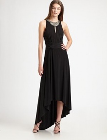 Fluid, artfully draped jersey, accented with a gorgeously intricate beaded neckline.Beaded jewel neckline with cutout detailSleevelessGathered bodiceFaux wrap waistbandAsymmetrical hemlineFully linedConcealed back zipAbout 47 from natural waist92% polyester/8% spandexDry cleanMade in USA of imported fabricModel shown is 5'10 (177cm) wearing US size 4.OUR FIT MODEL RECOMMENDS ordering true size. Fluid, artfully draped jersey, accented with a gorgeously intricate beaded neckline.Beaded jewel neckline with cutout detailSleevelessGathered bodiceFaux wrap waistbandAsymmetrical hemlineFully linedConcealed back zipAbout 47 from natural waist92% polyester/8% spandexDry cleanMade in USA of imported fabricModel shown is 5'10 (177cm) wearing US size 4.OUR FIT MODEL RECOMMENDS ordering true size.