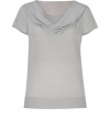 Stylish top in fine, pure light grey silk - Luxe fabric is soft to the touch and drapes beautifully - Slim, straight silhouette, hits just below hip - Short sleeves and small, side slit detail - Fabric darts at bust and back, wide hem - Beautifully proportioned, oversize cowl neck - Elegant, light rose lining at collar - Pair with a pencil skirt or wide-leg trousers and platform pumps