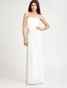 This beaded, strapless design has a fabulously vintage feel.StraplessSide ruching with beaded detailConcealed back zipFully linedAbout 42 from natural waist95% polyester/5% spandexDry cleanImportedModel shown is 5'10 (177cm) wearing US size 4. This beaded, strapless design has a fabulously vintage feel.StraplessSide ruching with beaded detailConcealed back zipFully linedAbout 42 from natural waist95% polyester/5% spandexDry cleanImportedModel shown is 5'10 (177cm) wearing US size 4.