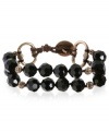 Black is twice as beautiful in this double-layer bracelet from Lucky Brand. Crafted from gold-tone mixed metal, the bracelet also features black glass stones for a classic look. Approximate length: 7-5/8 inches.