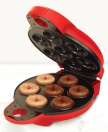 This do-it-all donut maker from Bella Cucina lets you serve up homemade mini doughnuts in no time flat (or round)! Baked instead of deep fried, these delicious treats are a healthier choice whenever you crave something sweet. One-year limited warranty. Model 13466. This do-it-all donut maker from Bella Cucina lets you serve up homemade mini doughnuts in no time flat (or round)! Baked instead of deep fried, these delicious treats are a healthier choice whenever you crave something sweet. One-year limited warranty. Model 13466.