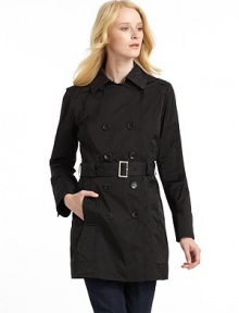 THE LOOKNotched collarDouble-breasted button front closureLong sleeves with three-button cuffsDual welt pockets with button closureButton tab at backAttached beltWater resistantMatching travel pouch includedTHE FITAbout 31 from shoulder to hemTHE MATERIALPolyesterCARE & ORIGINMachine washImported THE LOOKNotched collarDouble-breasted button front closureLong sleeves with three-button cuffsDual welt pockets with button closureButton tab at backAttached beltWater resistantMatching travel pouch includedTHE FITAbout 31 from shoulder to hemTHE MATERIALPolyesterCARE & ORIGINMachine washImported