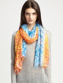A tribal-inspired print with a brightly colored design. 90% modal/10% cashmereAbout 55 X 72¾Dry cleanMade in Italy A tribal-inspired print with a brightly colored design. 90% modal/10% cashmereAbout 55 X 72¾Dry cleanMade in Italy