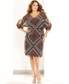 Snag a stylish office look with INC's split-sleeve plus size dress, defined by a blouson silhouette.